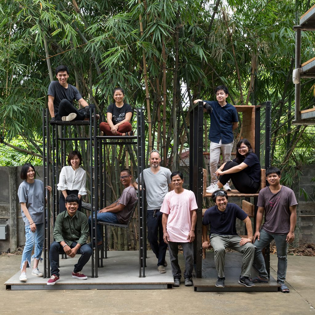 David (centre) and the Studiomake team photographed with an installation project designed by Klein Dytham Architecture that the studio fabricated last year